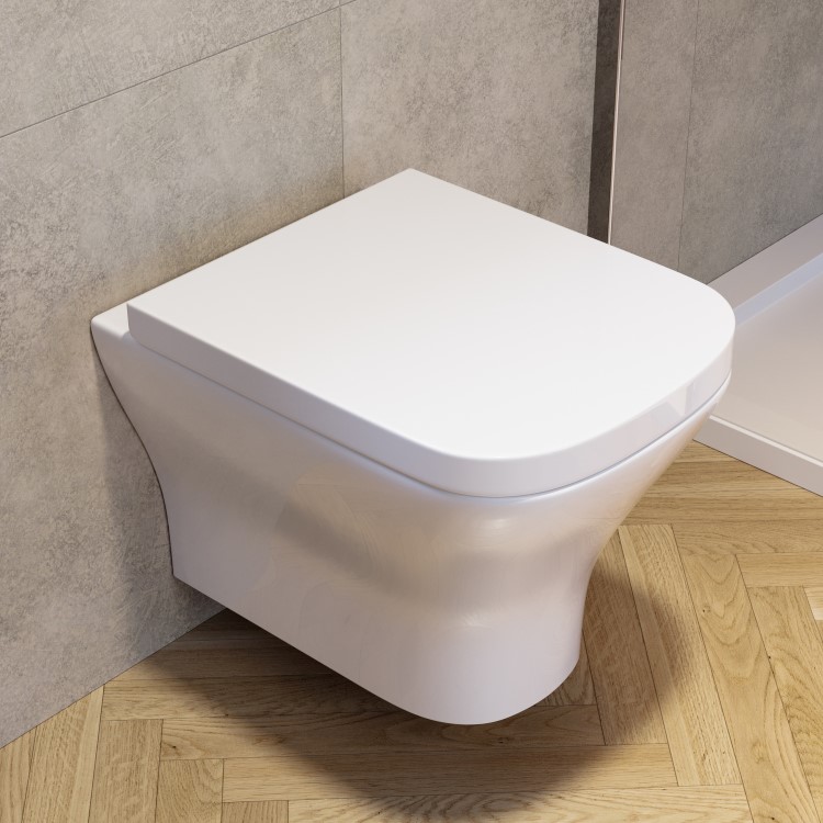 Wall Hung Rimless Toilet with Soft Close Seat, Brushed Brass Pneumatic Flush Plate, 1160mm Frame & Cistern - Austin
