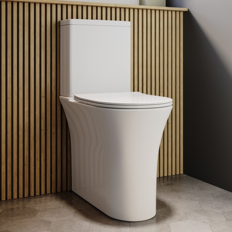 Close Coupled Closed Back Comfort Height Toilet with Soft Close Seat and Brushed Brass Push Button - Indiana