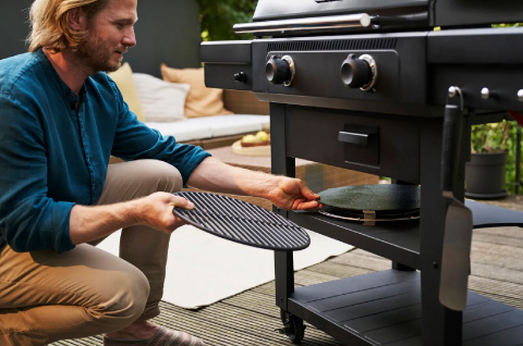 Integrated storage for a tidy grill station.