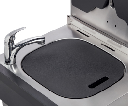 Practical sink and chopping board.