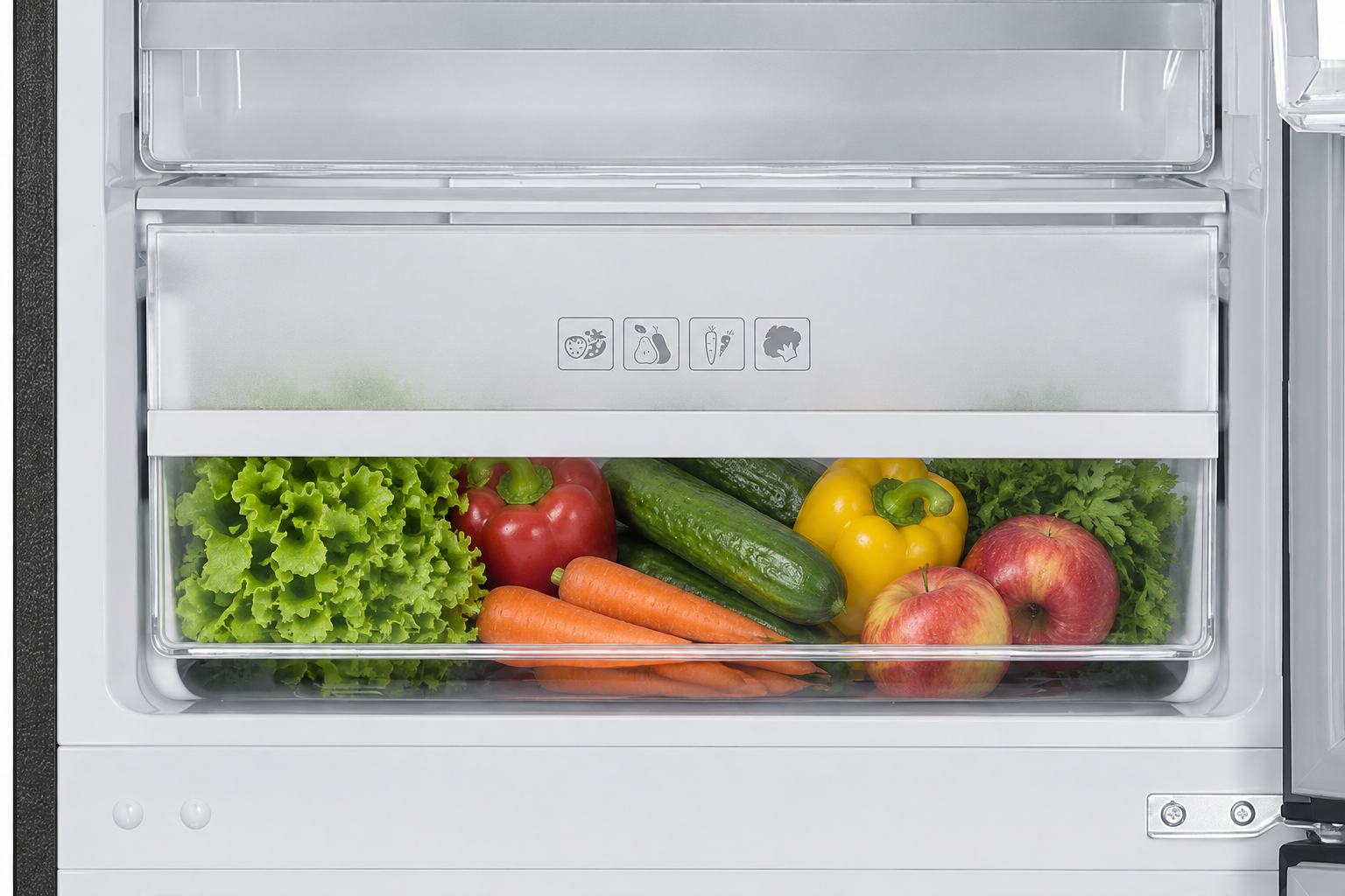 Humidity control crisper drawer filled with fresh vegetables