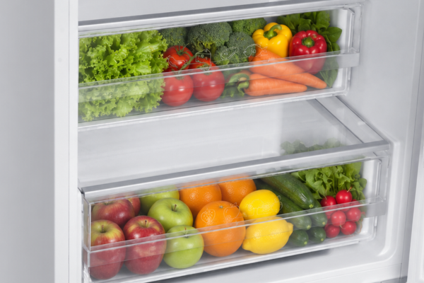 Two crisper drawers filled with fruit and vegetables